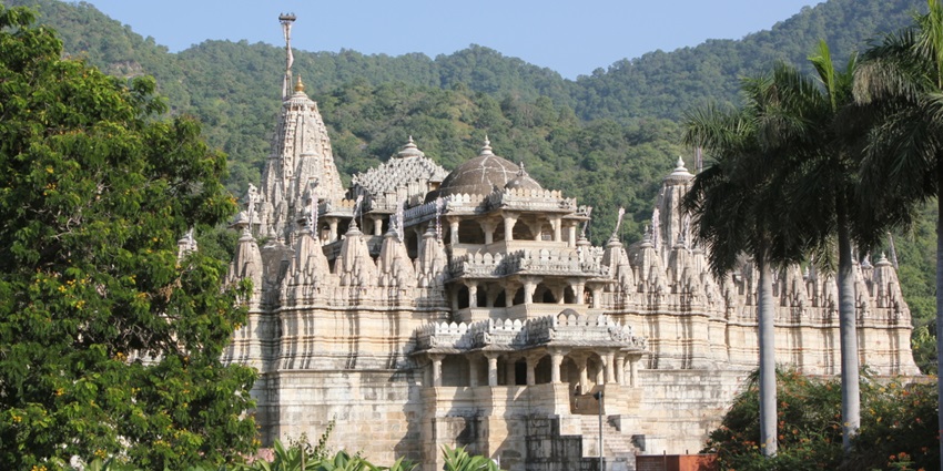 Historic Mandleshwar Temple, dedicated to Lord Shiva, with intricate carvings and lush surroundings.