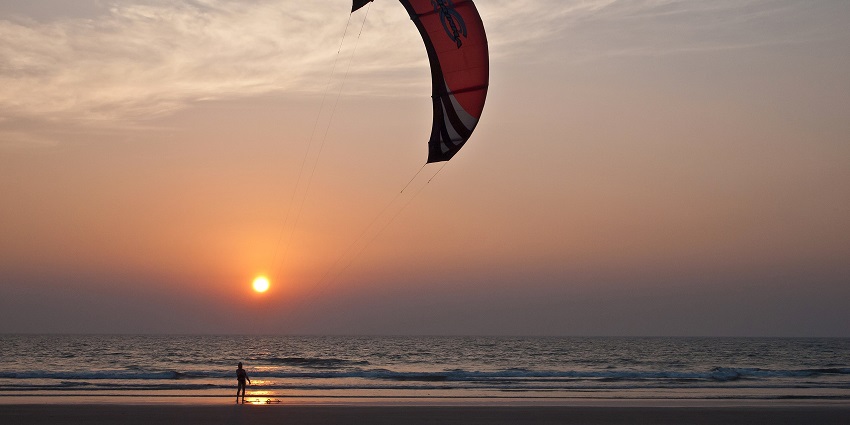 Enjoy beautiful sunset views at the serene Mandrem Beach, a unique beach in North Goa.