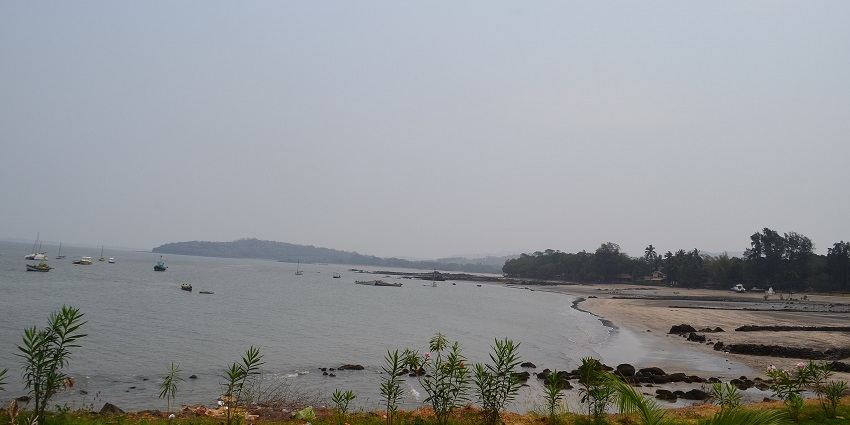 A serene view of the Mandwa Beach, one of the top places to visit in Alibaug for couples.