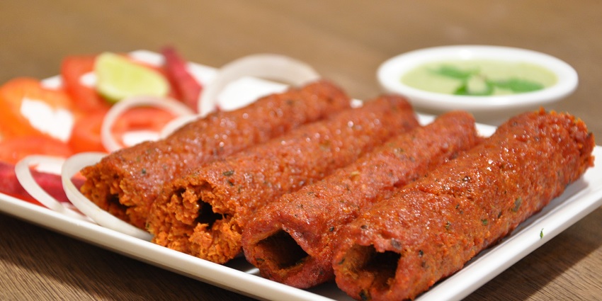 Busy Manek Chowk serves some delicious mutton kebabs and chicken curries.