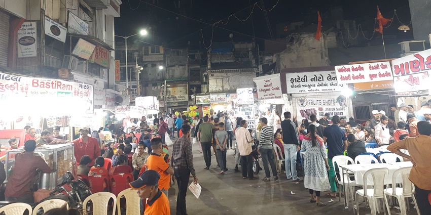 Manek Chowk Market is open during the daytime, lined with small shops selling traditional items and jewellery.