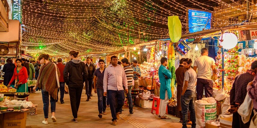 Night view of Manek Chowk adorned with beautilful lights. the vendors are selling Navratri festive items