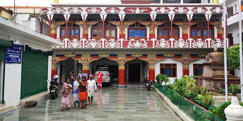 Mangala Gauri Temple, near to Gaya Museum, surrounded by trees with distinct red and white exterior.