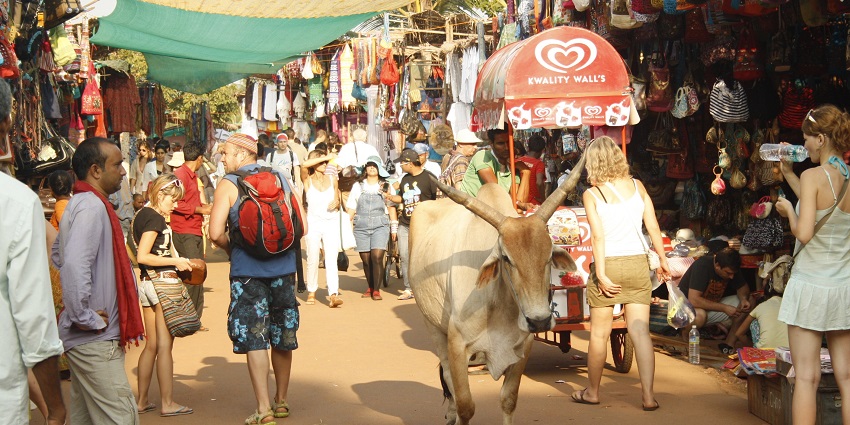 Bustling streets of the market, with vendors aligning the streets and tourists wandering around