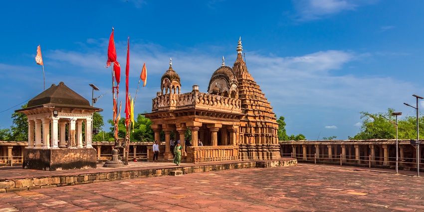 Chausath Yogini Temple surrounded by dense foliage and scenic views