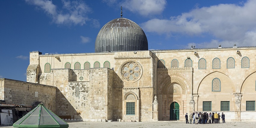 The Al-Aqsa Mosque similar to one in Nepal, featuring its limestone façade and dome.