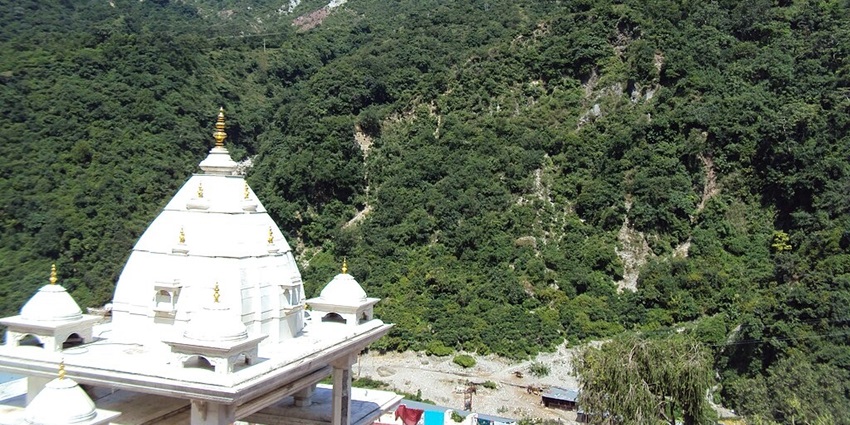 panoramic image of the beautiful Mata Mata Vaishno Devi Temple shrine surrounded by lush greenery