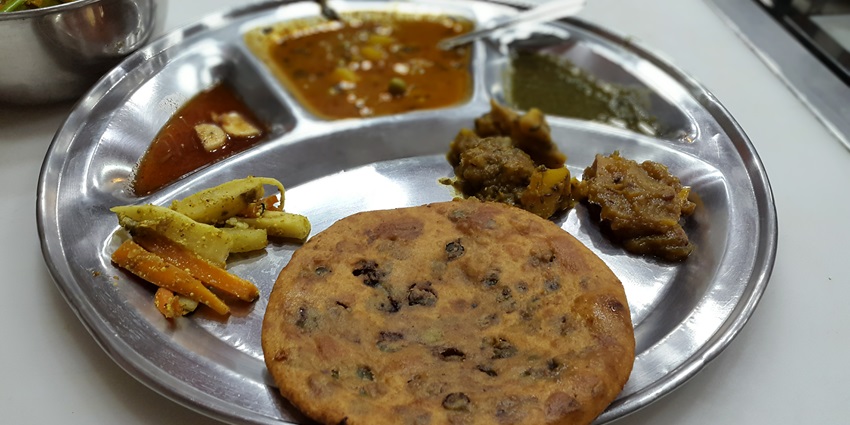 One of the best street food places in Delhi, Parathe wali gali serves amazing matar paratha.