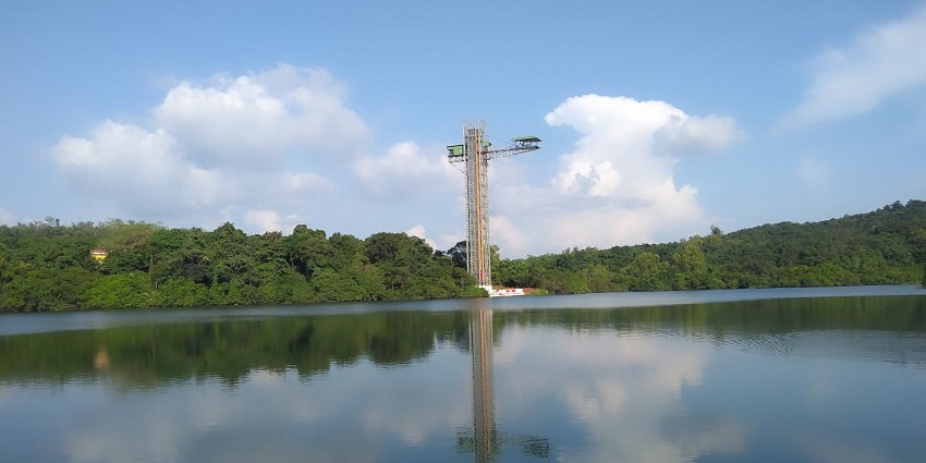 Image of shot of Mayem Lake in Goa and the Structure in the centre is a bungee Jumping