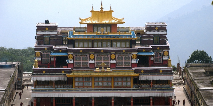 The beautiful facade of a serene monastery with intricate details for visitors to witness.
