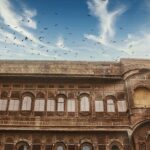 A stunning image of Mehrangarh Fort, a large fortress made of red sandstone near Jodhpur.