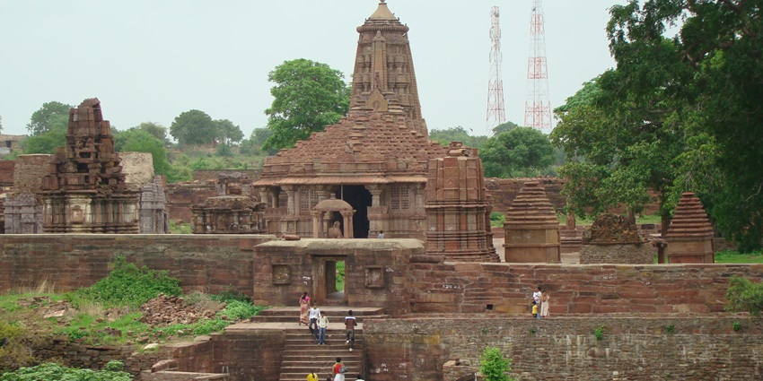 Menal Temples, captivating visitors, features 11th-century carvings along a waterfall