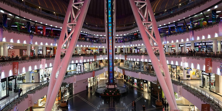 An inside view of the iconic Metro Walk Mall decorated with vibrant dazzling lights.