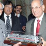 Mohd. Hamid Ansari being presented a model of Metro train by the Chairman of Delhi Metro Rail Corporation.