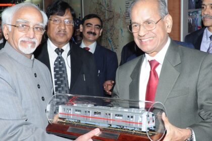 Mohd. Hamid Ansari being presented a model of Metro train by the Chairman of Delhi Metro Rail Corporation.