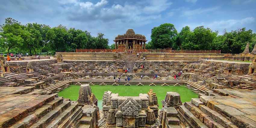 Modhera Sun Temple in Mehsana, Gujarat, showcasing ornate carvings and a grand architectural design