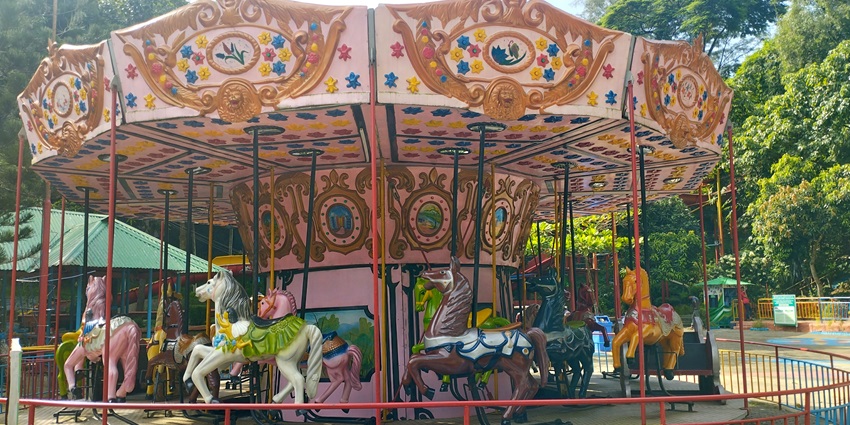 A picture of visitors enjoying an exciting ride at an amusement park in Sonipat