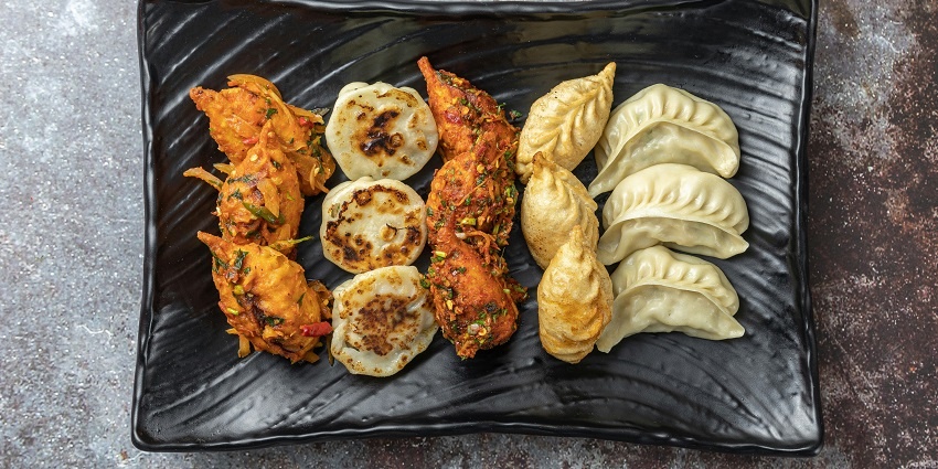 Image of delicious momos in varieties from steamed to fried and tandoori momo
