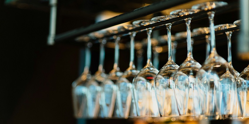 Image of glasses upside down and handing decorated in a Bar cum cafe at Hauz Khas