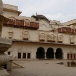 Moti Doongri Fort features an 18th-century marvel with carvings, near Ganesh Temple.