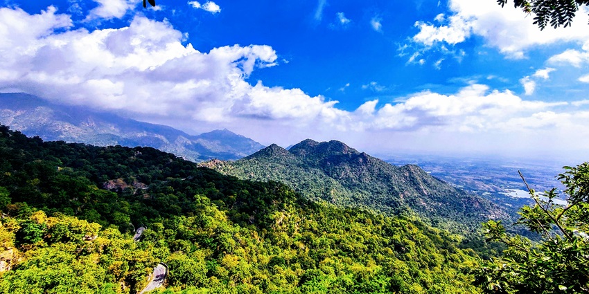 A panoramic view of the rugged, rocky landscape of Mount Abu, a popular tourist destination in Rajasthan