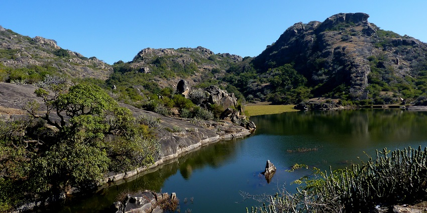 Panoramic view of the Mount Abu, with a serene river streaming nearby