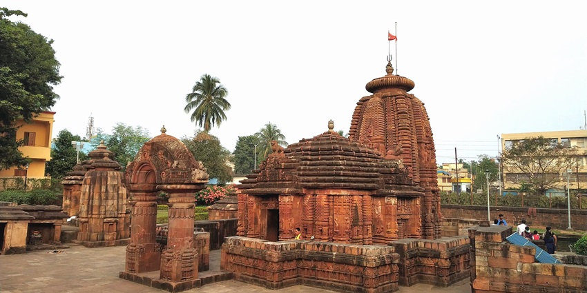 Historic Mukteshwar Temple surrounded by lush greenery and high footfall of pilgrims.