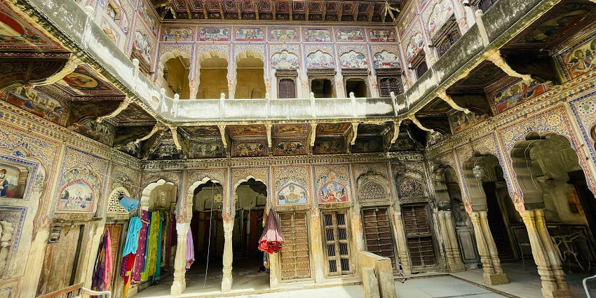Intricate Rajasthani architecture of Murmuria Haveli, showcasing artwork and design.
