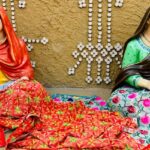 An image of two women sitting on a bed at one of the museums in Patiala, Punjab, India.