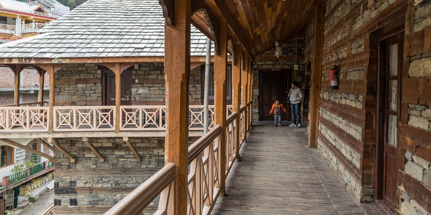 Explore the stunning architecture of Naggar Castle on your vacation to Himachal Pradesh.