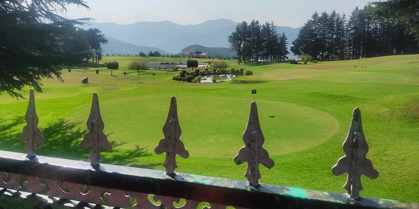 An image of lush green landscapes of Naldhera which is a serene hill station in Shimla.