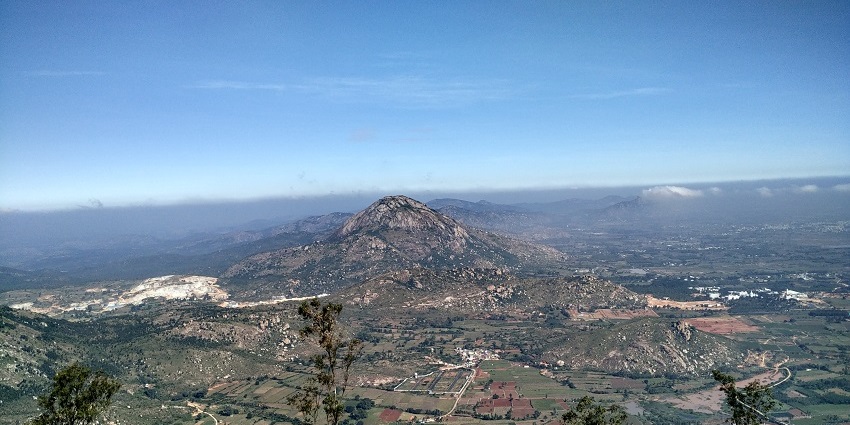 View from the hills, a magnificent panorama of the surrounding peaks stretches to the horizon.