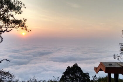 Panoramic view of the sunrise at hill stations near Bangalore within 100 Kms surrounded by foggy clouds