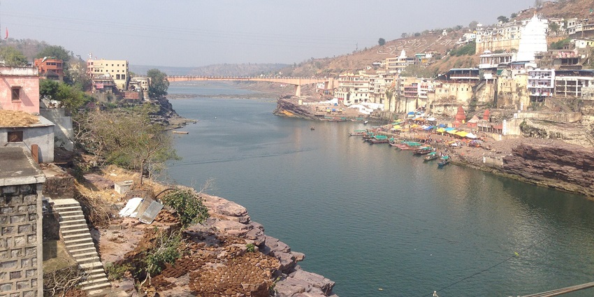 Serene view of the Narmada River near Omkareshwar, a famous place near the Temple.
