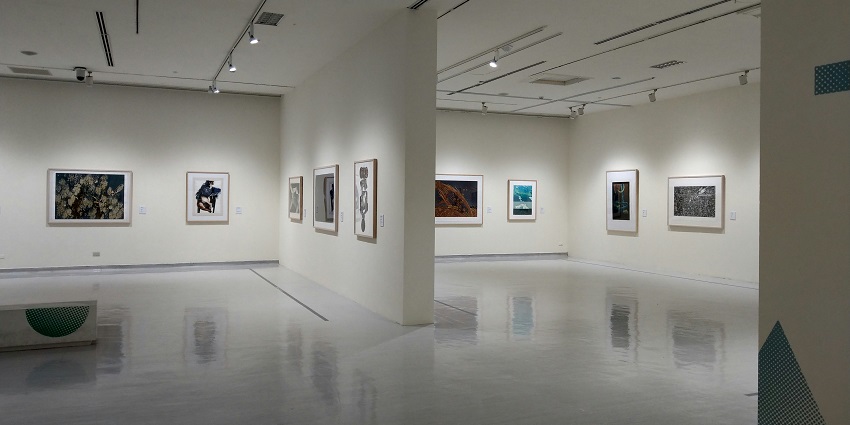 An inside view of a famous tourist attraction of the region featuring exotic paintings.