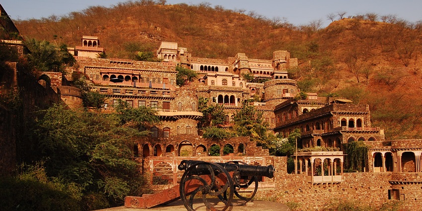 The grand Neemrana Fort, now a luxury heritage hotel, offering history and hospitality near Alwar.