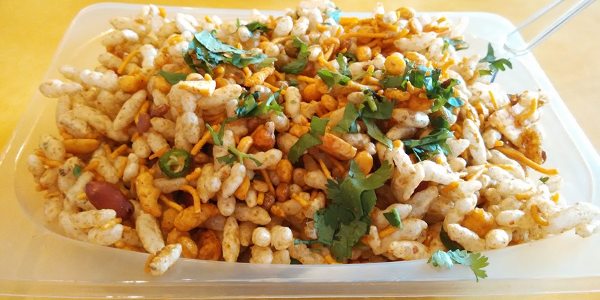 A vibrant bazaar offering delicious bhel puri and pav bhaji, bursting with local flavours