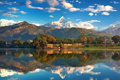 A stunning view of lake and Himalayan peaks in Nepal–perfect spot for Nepal Music Festival