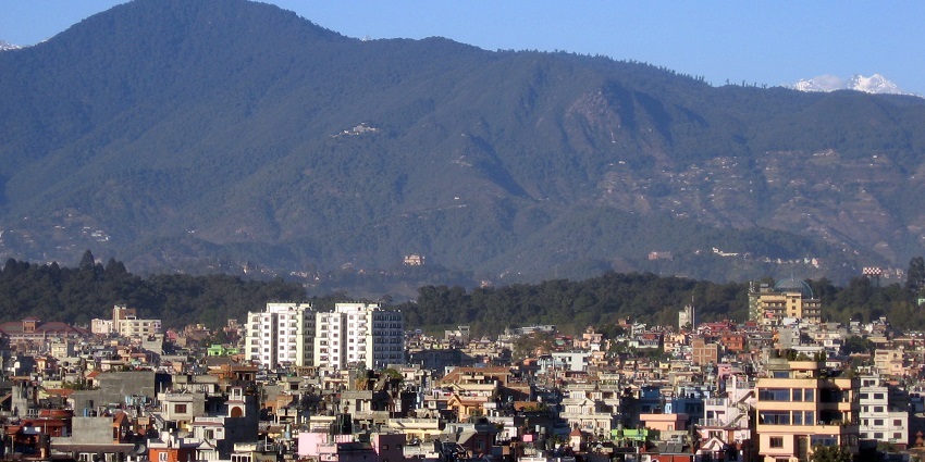 A serene view of Kathmandu showcasing the beautiful Sipucho Hill in the background.