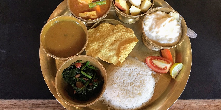 An image of a famous cuisine to try on your next vacation to Kathmandu, Nepal.