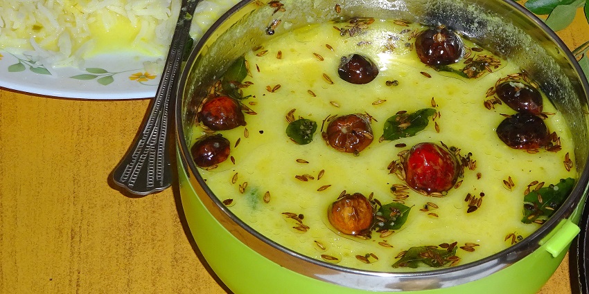 A simple Gujarati kadhi served with bajra roti