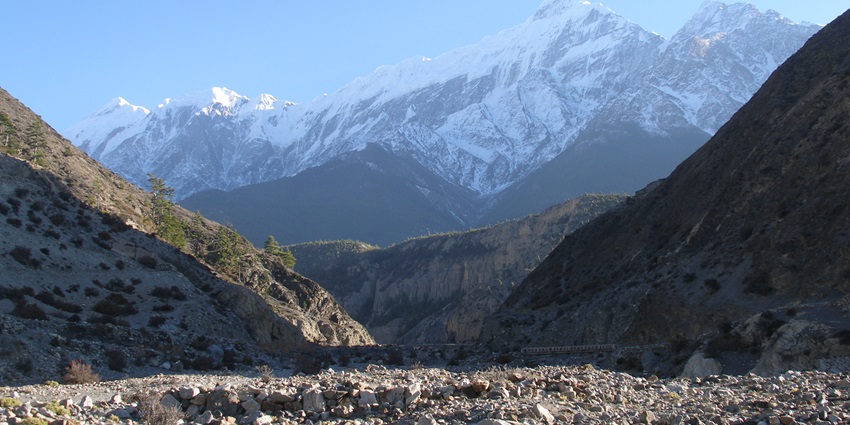 A stunning view of the Mustang Valley in Nepal that goes through the gigantic Himalayas