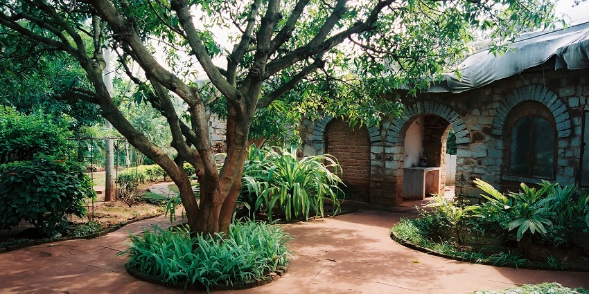 An image of a house complex at the Nrityagram village near Bangalore