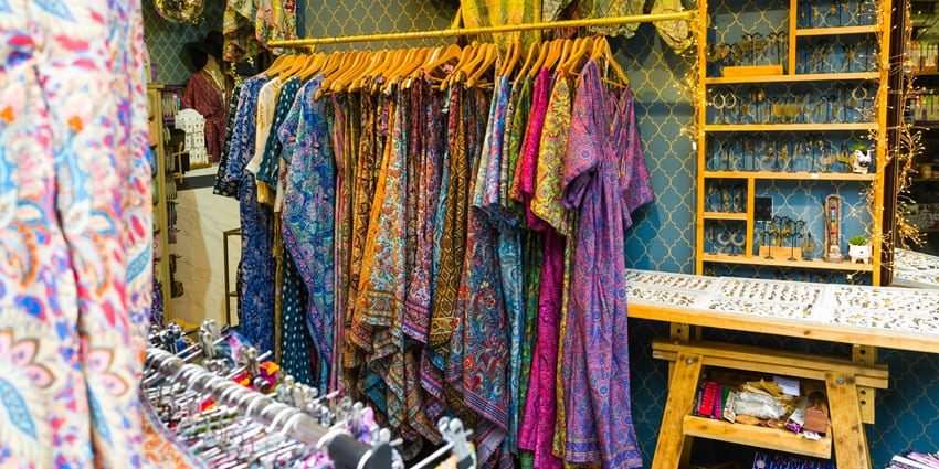 A store at Old Qila Mubarak Market in Punjab selling Punjabi suits and maxi dresses.