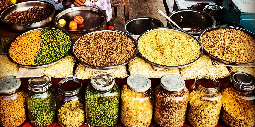 Vibrant Onukudelli Market showcasing tribal life and local produce with a display of spices