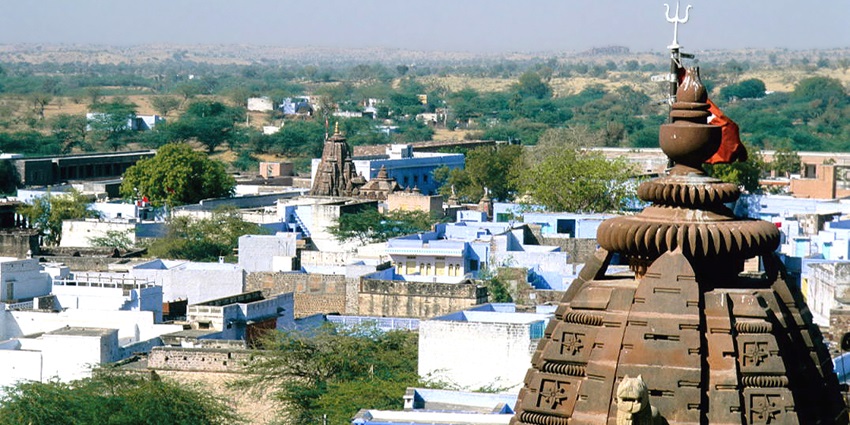 A landscape view of the Osian town showcasing its blue houses and temples.