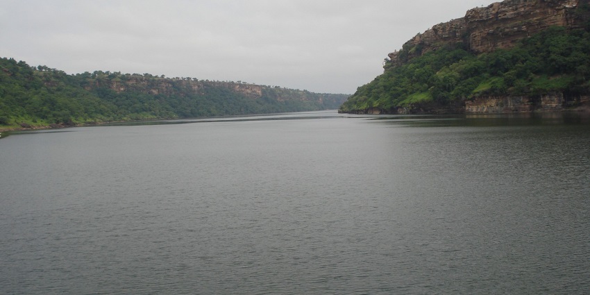 A scenic view of sunrise over Gandhi Sagar Lake in Mandsaur, India.