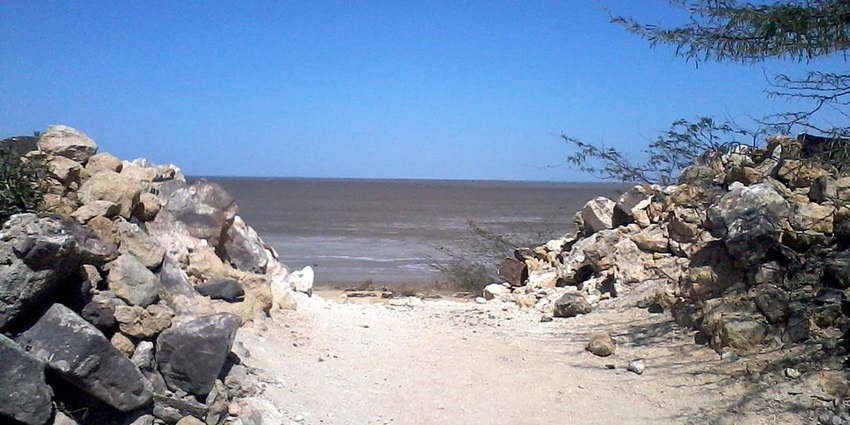 View of the beach and rocks from the Lakhpat Fort, offering a serene atmosphere.