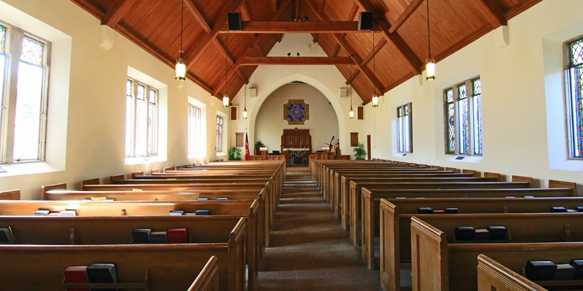 Majestic cathedral interior with high vaulted ceilings, arches, and intricate details