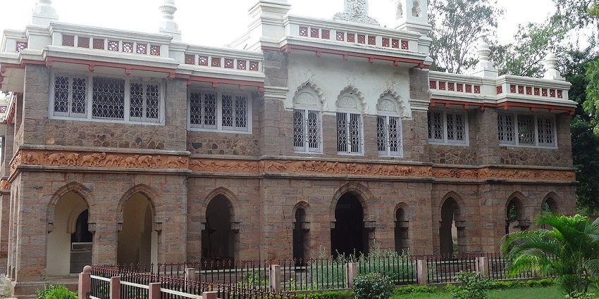 Scenic snap of the Bapu museum surrounded by the beautiful green lush trees and garden
